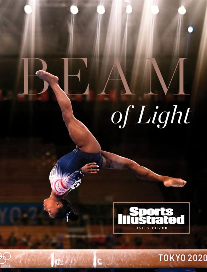 Simone Biles in the air on balance beam with the text Beam of Light